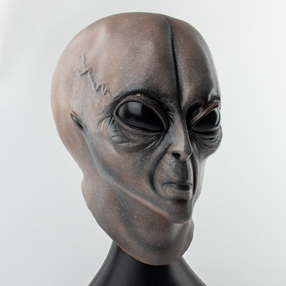 This unique Alien Mask Latex Headgear is sure to make a statement at your next Halloween celebration! Expertly crafted from silicone for maximum durability, it features intricate detailing for a realistic look and feel. Enjoy superior comfort and style, knowing you have the most eye-catching costume in the room.