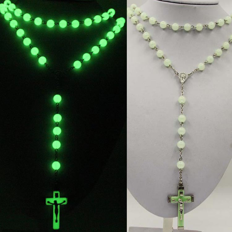 This Acrylic Glow-in-the-dark Rosary Cross Necklace Christian features a glow-in-the-dark cross pendant perfect for expressing your faith. The Christian rosary helps to strengthen devotion, providing a feeling of spiritual peace. Made from acrylic, this necklace is both lightweight and striking.