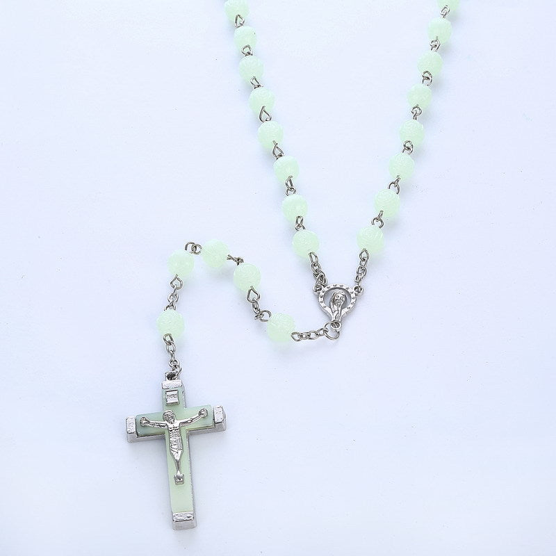 This Acrylic Glow-in-the-dark Rosary Cross Necklace Christian features a glow-in-the-dark cross pendant perfect for expressing your faith. The Christian rosary helps to strengthen devotion, providing a feeling of spiritual peace. Made from acrylic, this necklace is both lightweight and striking.