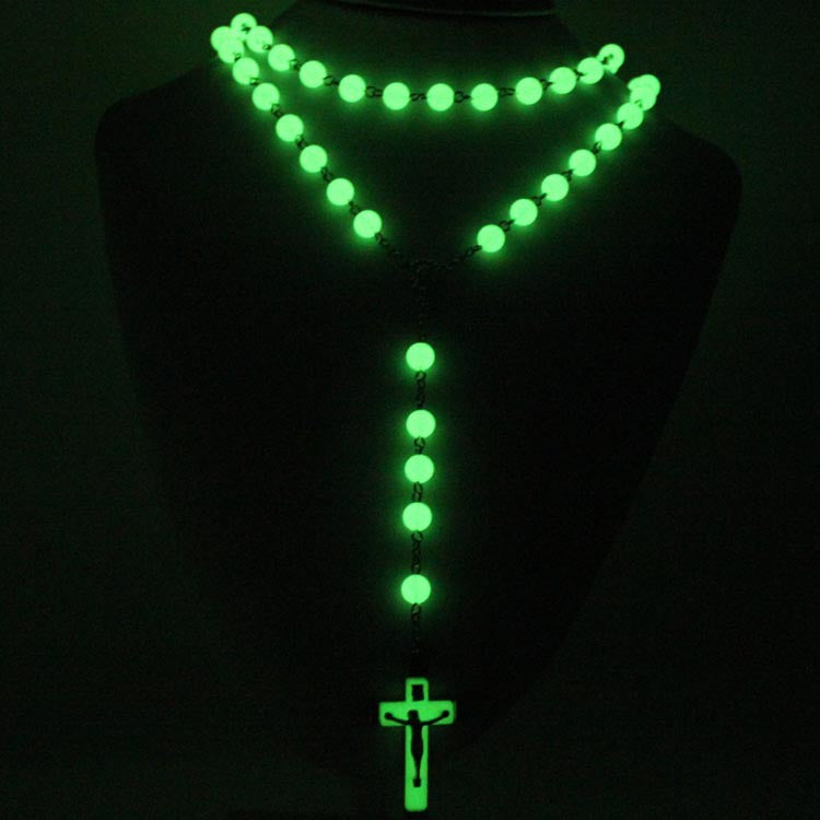 This Acrylic Glow-in-the-dark Rosary Cross Necklace Christian features a glow-in-the-dark cross pendant perfect for expressing your faith. The Christian rosary helps to strengthen devotion, providing a feeling of spiritual peace. Made from acrylic, this necklace is both lightweight and striking.