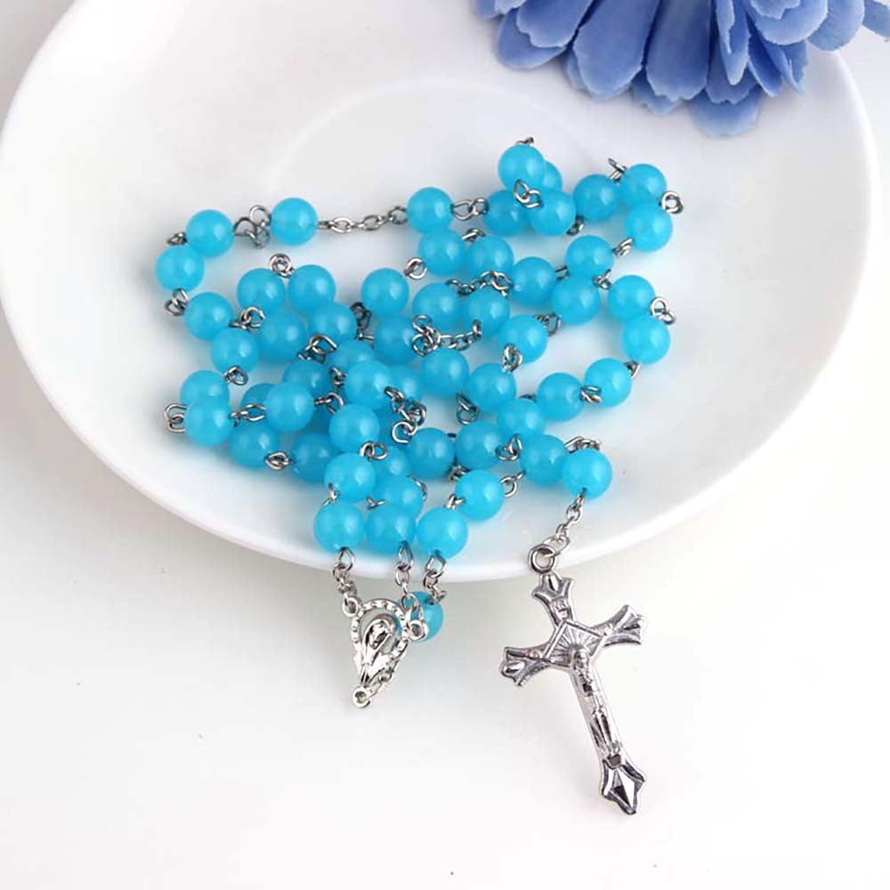 This Acrylic Glow-in-the-dark Rosary Cross Necklace Christian features a glow-in-the-dark cross pendant perfect for expressing your faith. The Christian rosary helps to strengthen devotion, providing a feeling of spiritual peace. Made from acrylic, this necklace is both lightweight and striking.